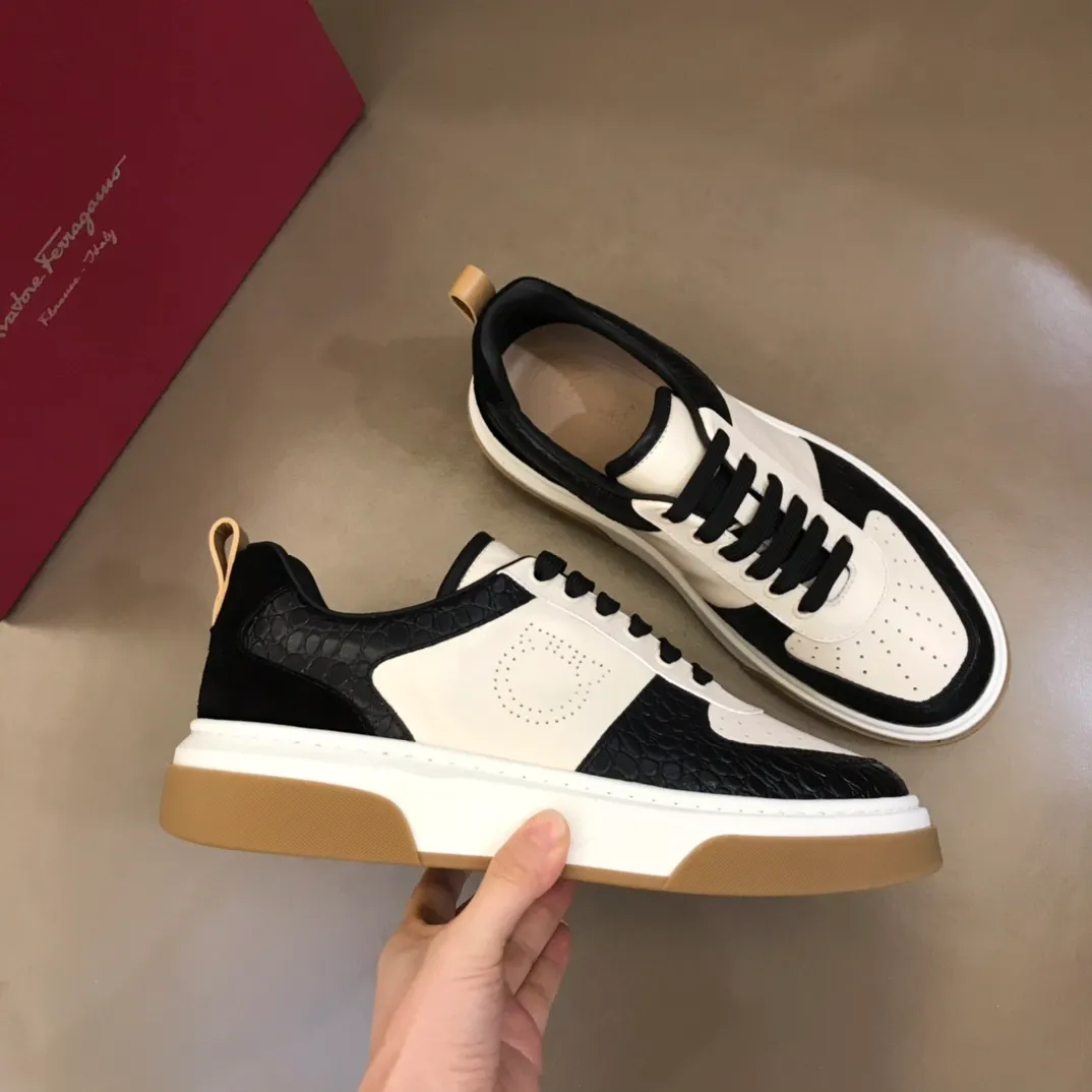 p440 "Salvatore Ferraga**" men's low-top fashion sneakers. This casual shoe has a novel structure and is made of soft calfskin. The contrasting color elements on the upper highlight the bold and avant-garde atmosphere. The first-layer cowhide lining is high-end and comfortable. Energetic and fresh, these shoes can be worn with casual looks or add a touch of street style to elegant trousers.  Size: 38-44